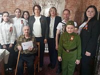 Соцработники и общественники поздравили тружеников тыла